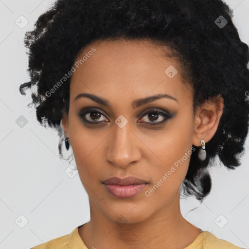 Joyful black young-adult female with medium  black hair and brown eyes