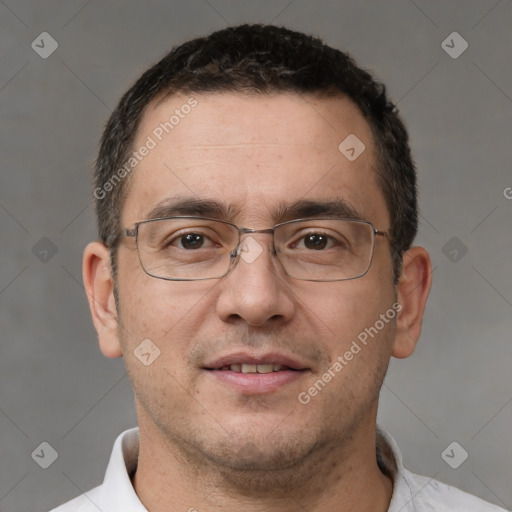 Joyful white adult male with short  brown hair and brown eyes