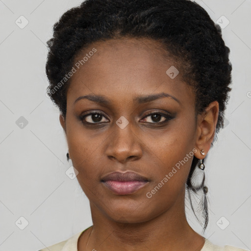 Neutral black young-adult female with short  brown hair and brown eyes