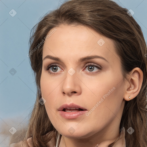 Neutral white young-adult female with long  brown hair and brown eyes