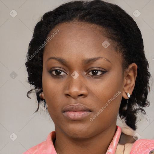 Neutral black young-adult female with medium  brown hair and brown eyes