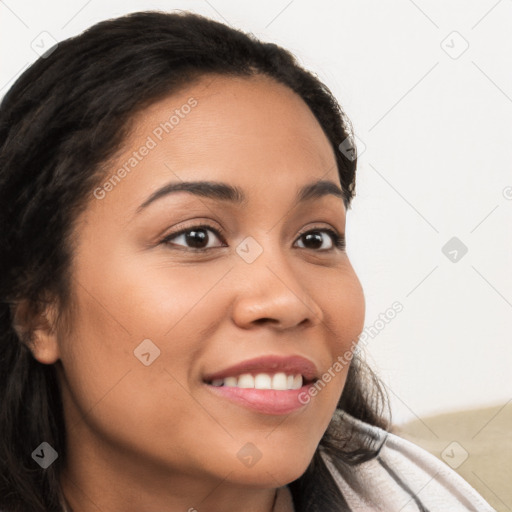 Joyful latino young-adult female with long  brown hair and brown eyes