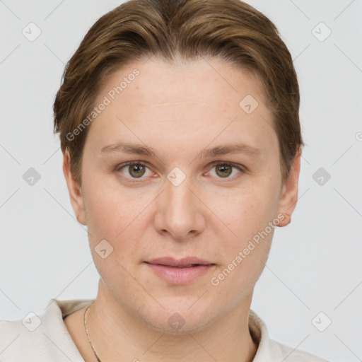 Joyful white young-adult female with short  brown hair and grey eyes