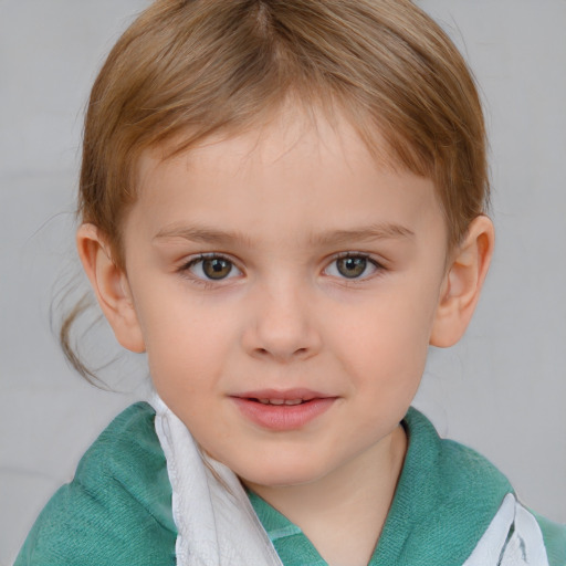 Joyful white child female with short  brown hair and blue eyes