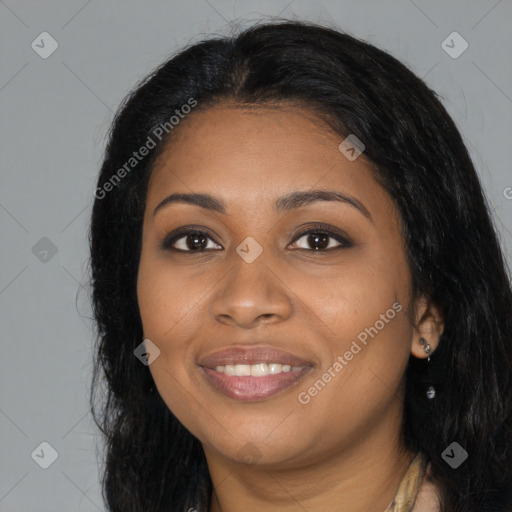 Joyful black young-adult female with long  black hair and brown eyes
