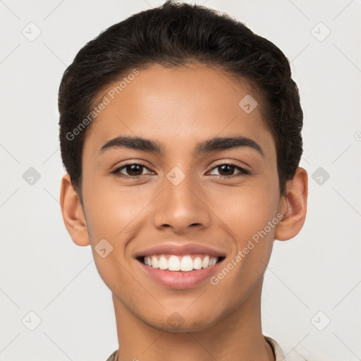 Joyful latino young-adult male with short  brown hair and brown eyes