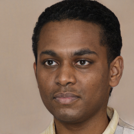 Neutral black young-adult male with short  black hair and brown eyes