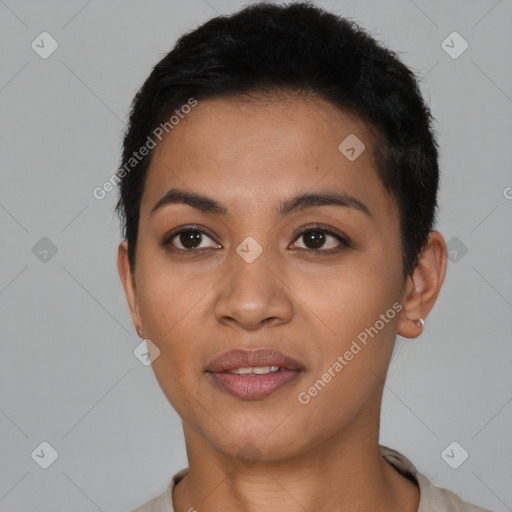 Joyful latino young-adult female with short  black hair and brown eyes