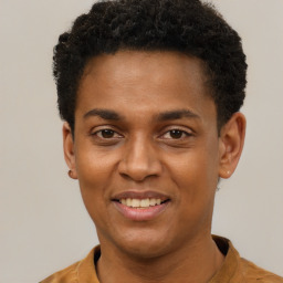 Joyful black young-adult male with short  brown hair and brown eyes