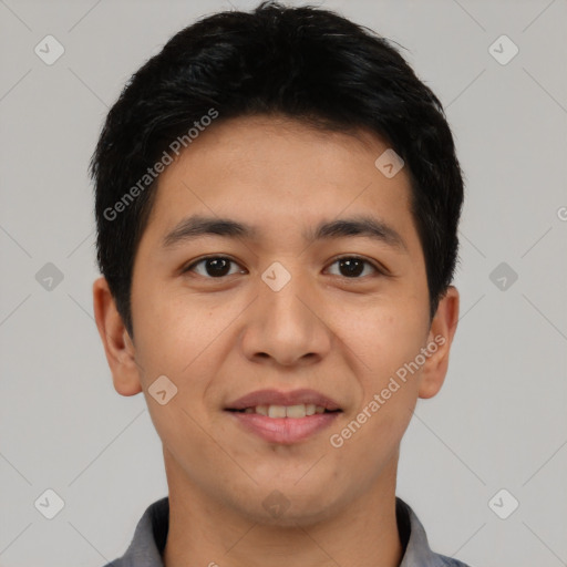 Joyful asian young-adult male with short  black hair and brown eyes