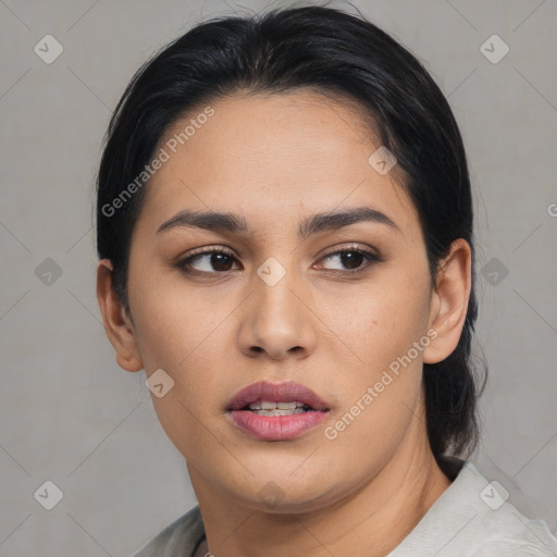 Joyful asian young-adult female with short  black hair and brown eyes