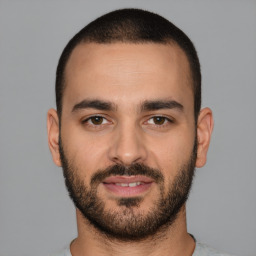 Neutral white young-adult male with short  black hair and brown eyes