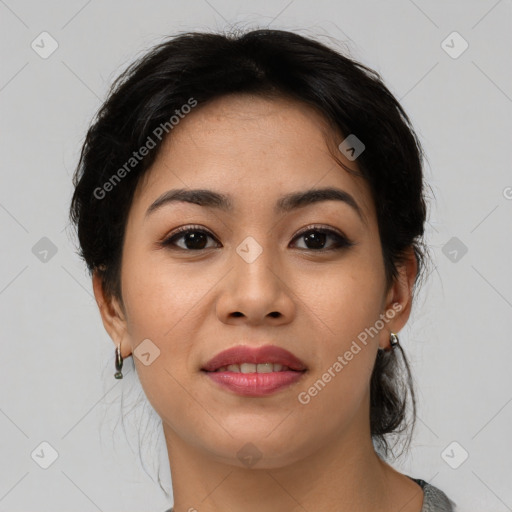 Joyful asian young-adult female with medium  black hair and brown eyes