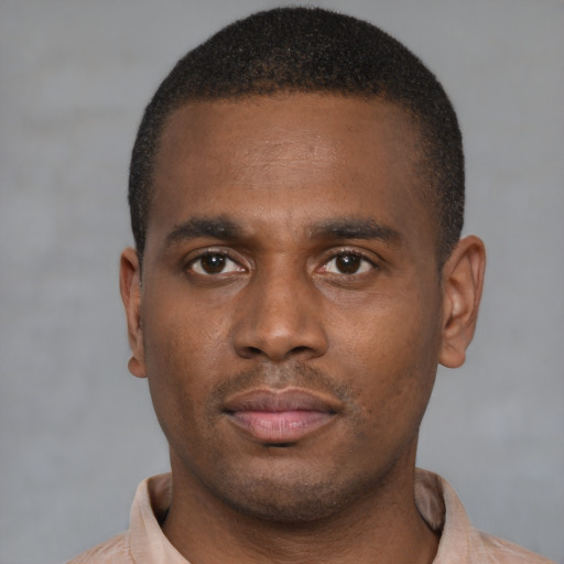 Neutral black young-adult male with short  brown hair and brown eyes