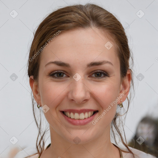 Joyful white young-adult female with medium  brown hair and grey eyes