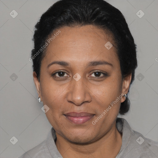 Joyful black adult female with short  black hair and brown eyes