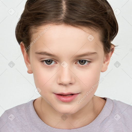 Joyful white child female with short  brown hair and brown eyes