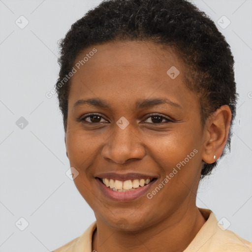 Joyful latino young-adult female with short  brown hair and brown eyes