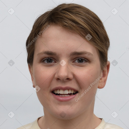 Joyful white young-adult female with short  brown hair and grey eyes