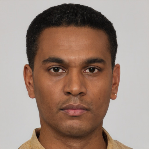 Neutral latino young-adult male with short  black hair and brown eyes