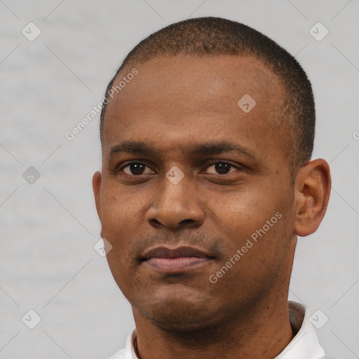 Neutral black young-adult male with short  black hair and brown eyes