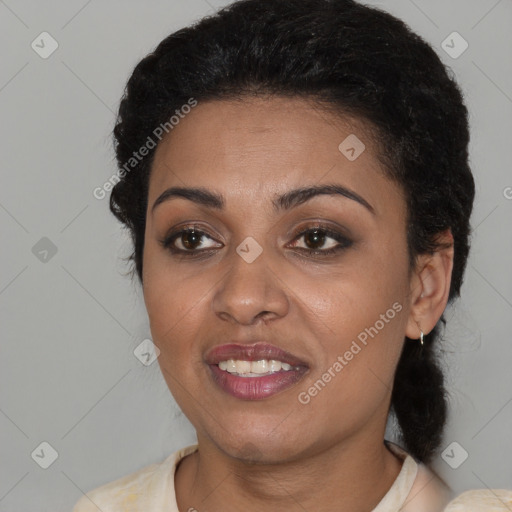 Joyful latino young-adult female with medium  brown hair and brown eyes