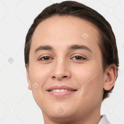 Joyful white young-adult female with short  brown hair and brown eyes