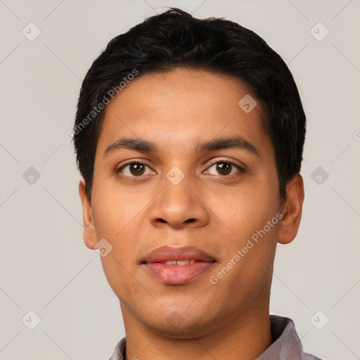 Joyful latino young-adult male with short  black hair and brown eyes