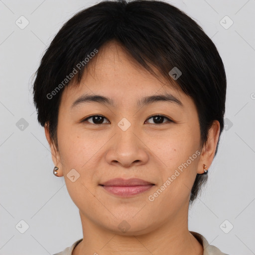 Joyful asian young-adult female with short  brown hair and brown eyes