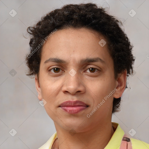 Joyful latino young-adult female with short  brown hair and brown eyes