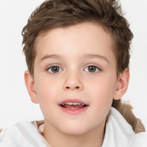 Joyful white child female with short  brown hair and brown eyes