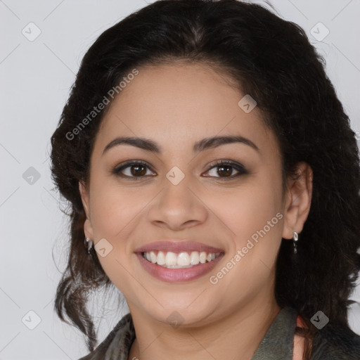 Joyful latino young-adult female with medium  brown hair and brown eyes