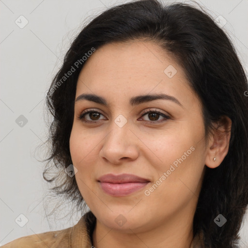 Joyful latino young-adult female with long  brown hair and brown eyes