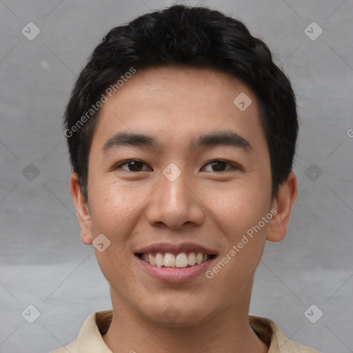 Joyful asian young-adult male with short  black hair and brown eyes