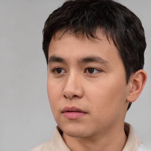 Neutral asian young-adult male with short  brown hair and brown eyes