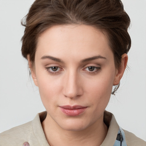 Neutral white young-adult female with medium  brown hair and grey eyes