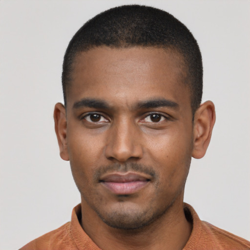 Neutral black young-adult male with short  black hair and brown eyes