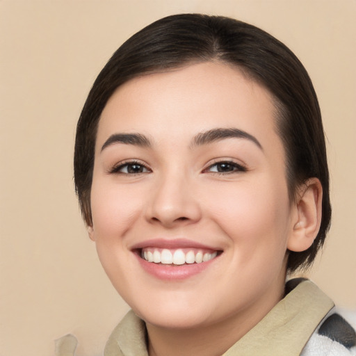 Joyful white young-adult female with medium  brown hair and brown eyes