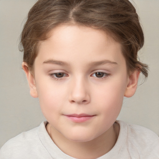 Joyful white child female with short  brown hair and brown eyes