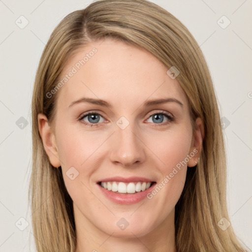 Joyful white young-adult female with long  brown hair and green eyes