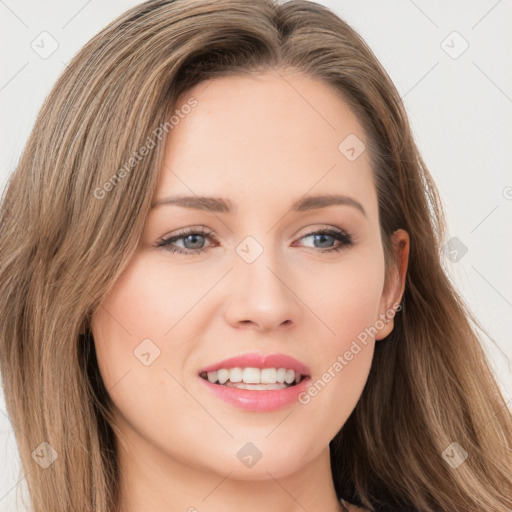 Joyful white young-adult female with long  brown hair and green eyes