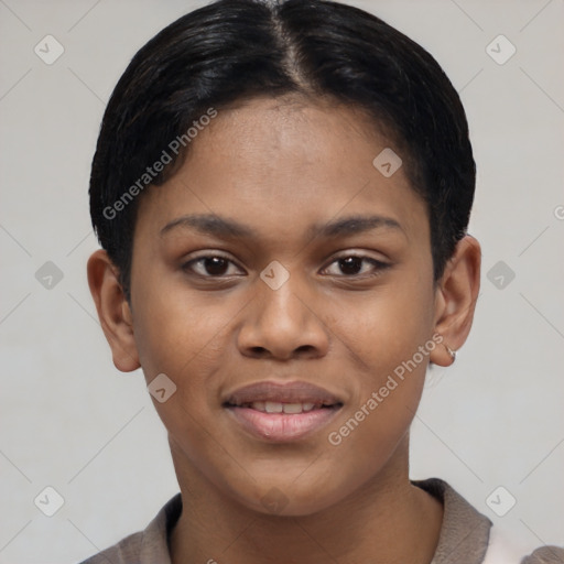 Joyful black young-adult female with short  black hair and brown eyes