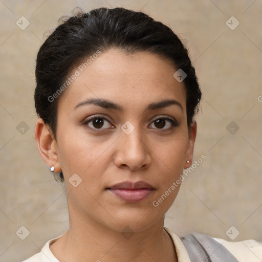 Joyful latino young-adult female with short  brown hair and brown eyes