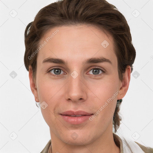 Joyful white young-adult female with short  brown hair and grey eyes