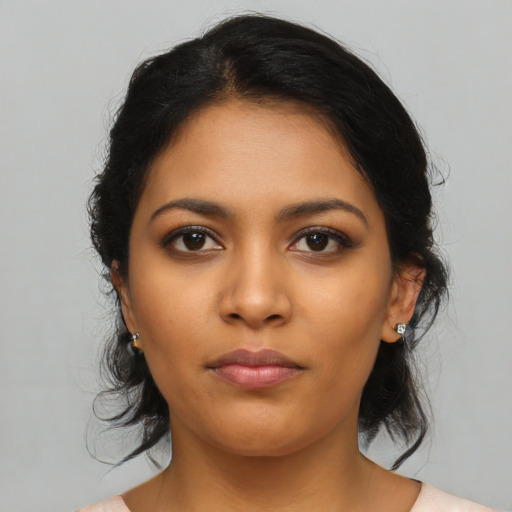 Neutral latino young-adult female with medium  black hair and brown eyes