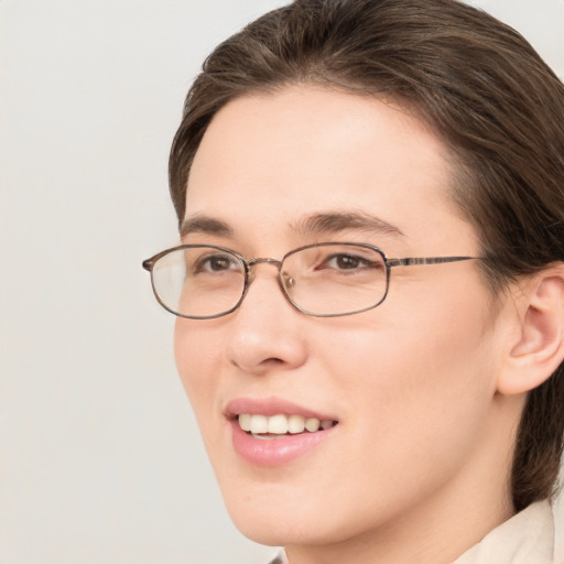 Joyful white young-adult female with medium  brown hair and brown eyes