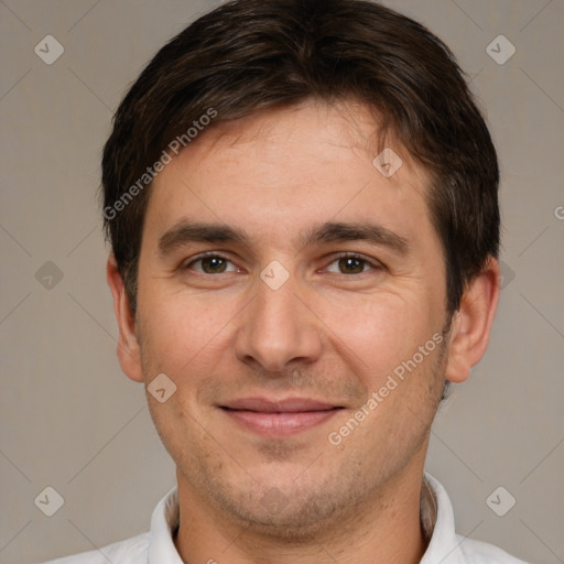 Joyful white young-adult male with short  brown hair and brown eyes