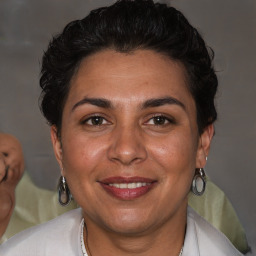 Joyful white adult female with short  brown hair and brown eyes