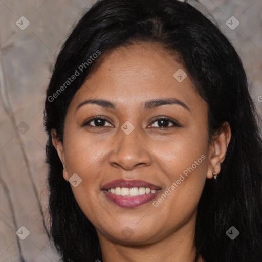 Joyful latino young-adult female with long  black hair and brown eyes