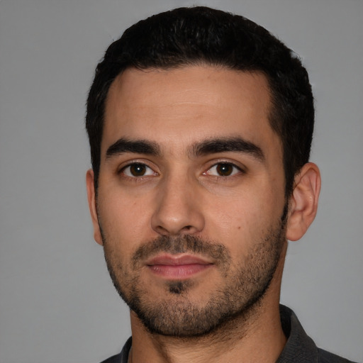 Neutral white young-adult male with short  black hair and brown eyes